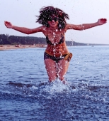 Girl splashing in Baltic sea water Photo (4252106)